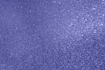 Abstract violet background Very peri tones. Glitter texture christmas background. Defocused abstract holidays lights on background.