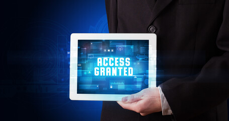 Person holding tablet, security concept