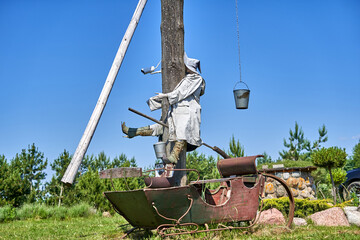 Decoration with witch and old sledge in the private park