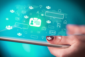 Close-up of a hand using tablet, social media concept
