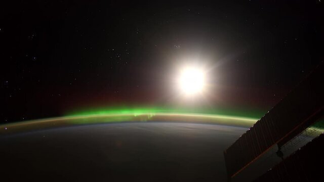 Aurora Borealis over the Atlantic Ocean.
The International Space Station.
Source material was provided by NASA.
Color correction was done, noise was removed and slowed down.