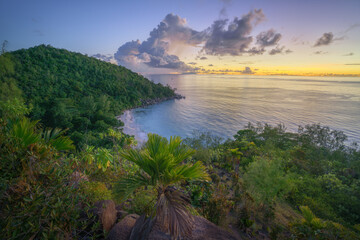 sunset at tropical beach anse georgette on praslin on the seychelles