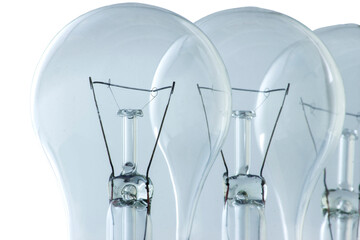 Old three incandescent bulbs on a white background. Close up photo