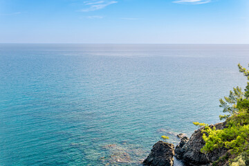 Mediterranean seascape with steep wooded coast