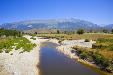 Fototapeta na wymiar Landscape with mountain and a river in Albania