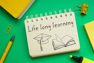 Life long learning is shown on the business photo using the text
