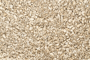 Light grey gravel (Pebble) floor texture, top view. Background