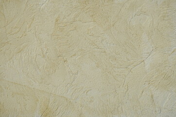 Textured beige plaster for a modern interior. Interior Design. Design ideas