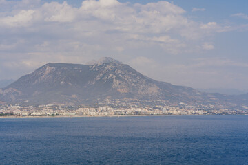 Sea landscape with mountains and cloudy sky, Turkey. Vacation recreation holiday travel adventure concept.