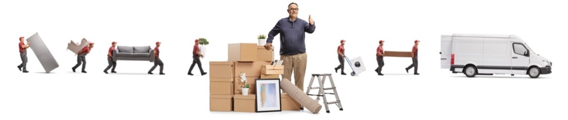 Mature man with a pile of cardboard boxes showing thumbs up and workers from a removal company with...