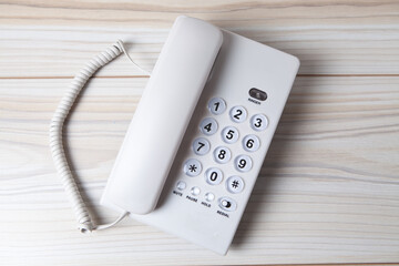 white home phone on the table