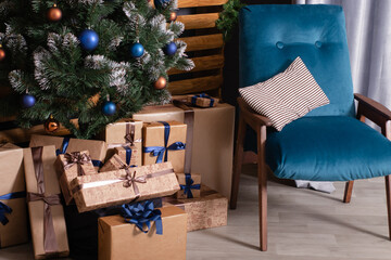 Stylish loft room interior with beautiful Christmas tree. dark blue and brown and gold colors. new...