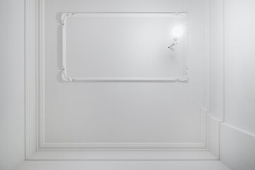 Detail of corner ceiling cornice with intricate crown molding.