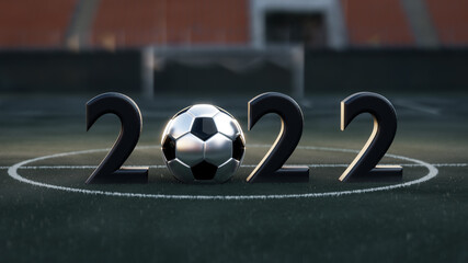 Close up view of 2022 number. Black text and soccer balls on the green soccer field, grass. New...