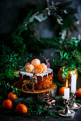 Fototapeta na wymiar Christmas panettone on a Christmas rustic background
