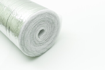 A roll of insulation made of foamed polyethylene with aluminum foil. Thermal insulation with...
