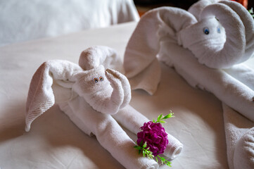 Fototapeta na wymiar Towels made into decorative elephants at a resort spa
