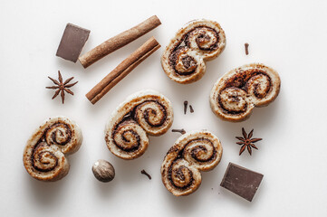Curd cheese croutons with chocolate, cinnamon sticks, anise stars.