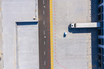 Aerial view of goods warehouse. Logistics center in industrial c