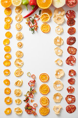 Assortment of Healthy and Tasty Dry Fruits on a White Background.