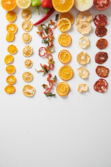 Assortment of Healthy and Tasty Dry Fruits on a White Background.