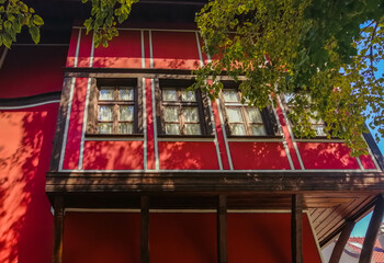 Traditional red building in Plovdiv old town , looking up