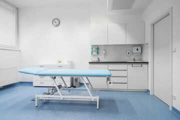 Clean and comfortable room in the hospital with examination table. Doctor's office. Doctor's room close up. Hospital check-ins.