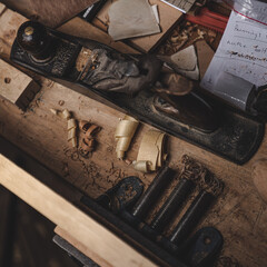 Close up of a plane and some sawdust