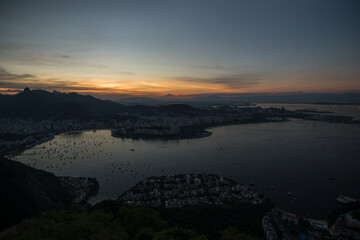 Rio de Janeiro, Brazil, April 2019 - Beautiful sunset view of Guanabara Bay and Urca neighborhood from a viewpoint at Sugarloaf Mountain 