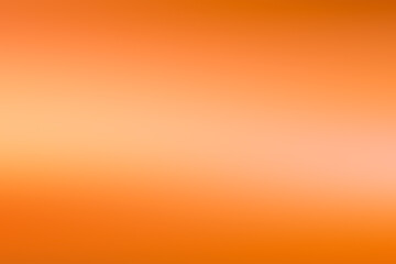 Gradient orange blur wallpaper with light stripe in the center