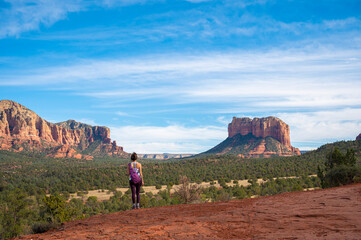 Woman hicking in Sedona at Red Rock county, Arizona