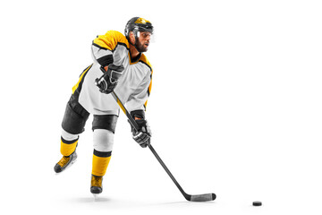 Athlete in action. Professional hockey player on white background. Sports emotions. Hockey concept....