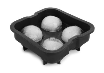 Frozen ice balls in mold on white background