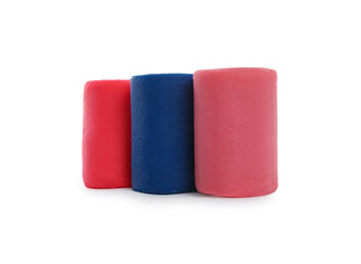 Different colorful play dough on white background