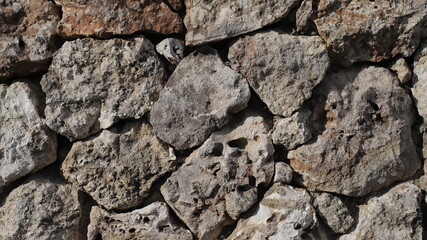 Fondo marrón natural de piedras y adoquines