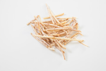 fried taro chips on white background. Thai style homemade healthy sweet snacks.
