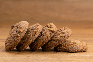 Dessert snack chocolate chip butter cookies on wooden table.