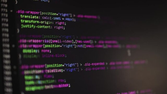 Computer hacker code programming scrolls on the computer screen