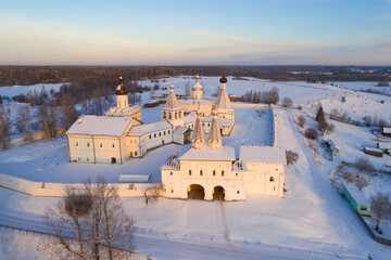 Fototapeta premium View of the ancient Ferapontov monastery on a December twilight. Vologda region, Russia