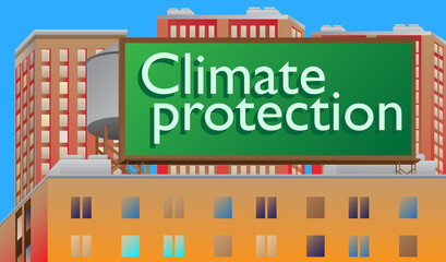 Climate protection text on a billboard sign atop a brick building. Outdoor advertising in the city. Large banner on roof top of a brick architecture.