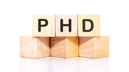 PhD inscription on wooden cubes isolated on a white background - obrazy, fototapety, plakaty