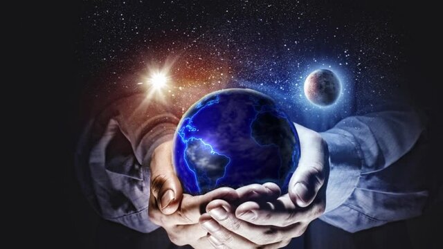 The planet rotates in the hands