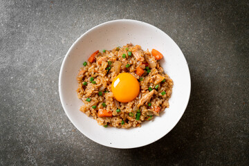 salmon fried rice with pickled egg on top