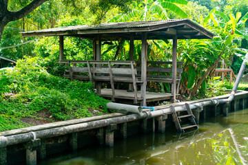 wooden pavilion by the canal