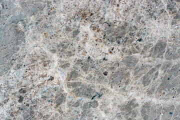 Marble stone texture with varied pattern with fine lines.