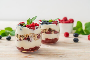 homemade raspberry and blueberry with yogurt and granola