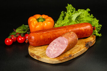 Pork ham sausage cut isolated
