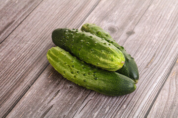 Fersh juicy green cucumbers heap
