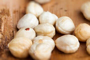 dried hazelnutsnuts on a wooden table