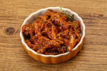 Canned anchovy in tomato sauce